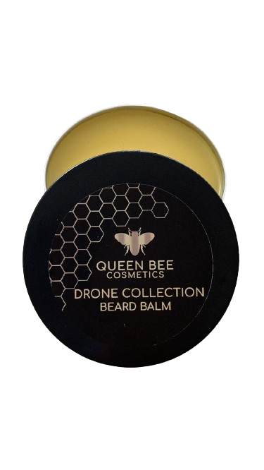 Beeswax beard balm in a metal tin. Tin open.