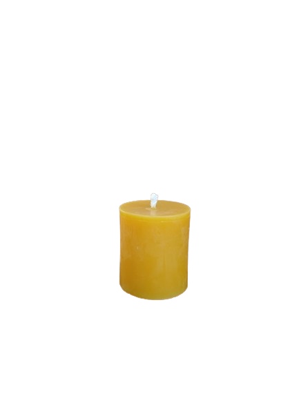 Small natural beeswax pillar candle