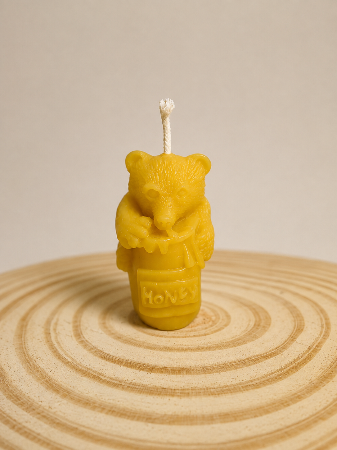 Bear on honeypot candle