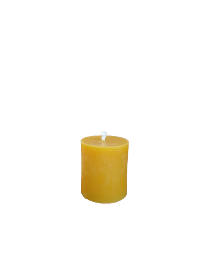 Small natural beeswax pillar candle