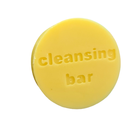 Beeswax solid round cleansing bar. 