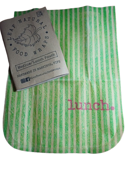 Green and white striped beeswax food lunch pouch with 'lunch' text and a Leaf Natural Food Wraps label.