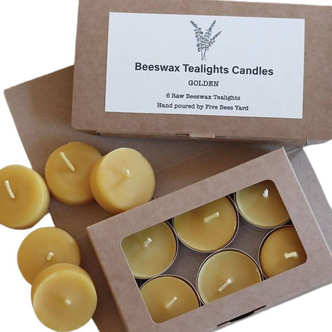 Beeswax tealights in a cardboard box with a visible brand label.