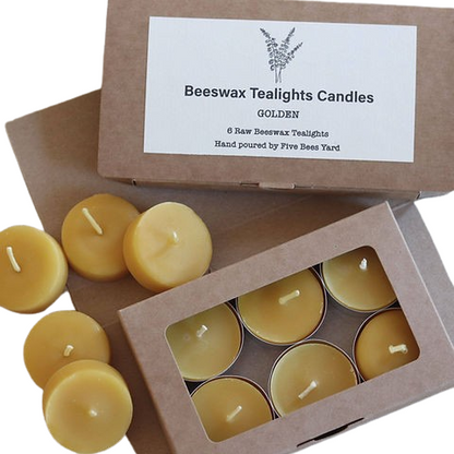 Beeswax tealights in a cardboard box with a visible brand label.