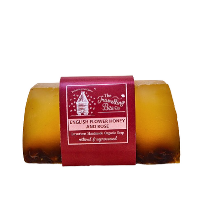 handmade bar of soap with a red label on a white background