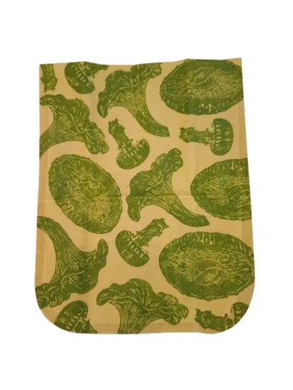 snack beeswax pouch beige fabric with green mushroom pattern on a white background
