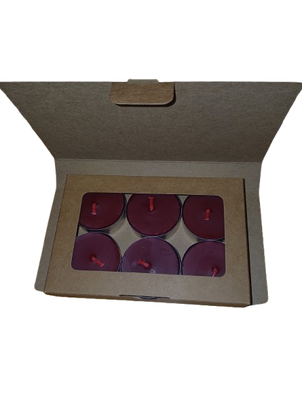 Set of six burgundy tealight candles in a cardboard box on a white background