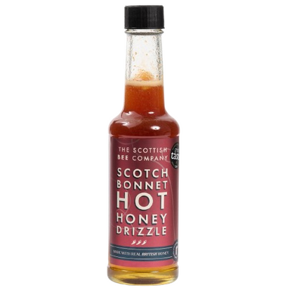 Bottle of Scotch Bonnet Hot Honey Drizzle from The Scottish Bee Company on a white background