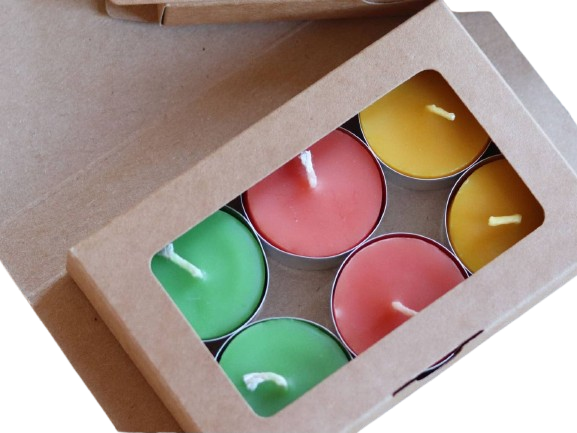 Set of colorful beeswax tealight candles in a cardboard window box