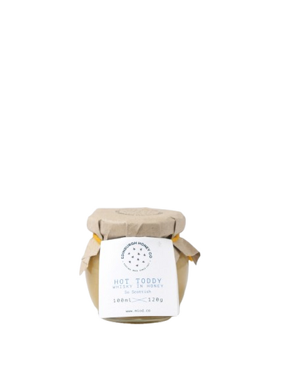 Jar of 'Hot Toddy' infused Edinburgh honey on a white background