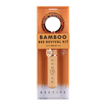 Bamboo Bee Revival Kit packaging with a wooden tool with rose gold trim and bee ID tag on an orange background.